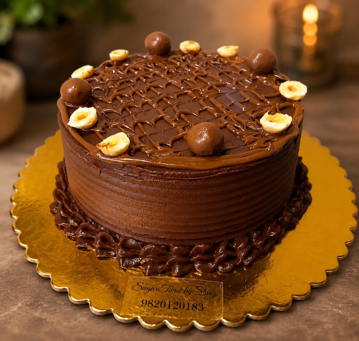 Belgian chocolate cake with hazelnut pieces and chocolate truffle topping